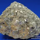 Rare Fluornatromicrolite (type locality) with Muscovite, Albite, and Schorl - image 3