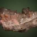 Rhodochrosite after Calcite on Quartz var. Amethyst - image 5