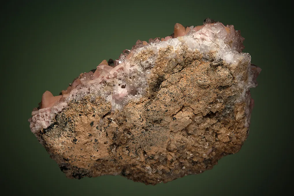 Rhodochrosite after Calcite on Quartz var. Amethyst - image 3