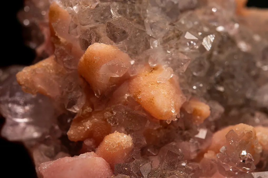 Rhodochrosite after Calcite on Quartz var. Amethyst - image 2