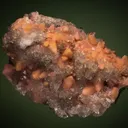 Rhodochrosite after Calcite on Quartz var. Amethyst - image 1