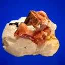 Rhodochrosite and Aegirine on Analcime - image 1