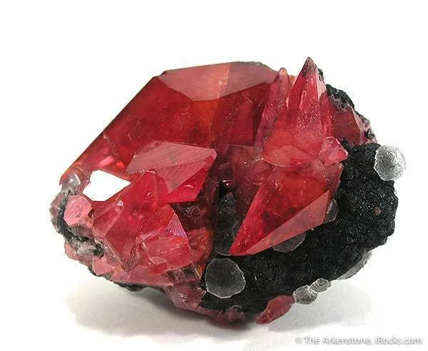 Rhodochrosite and Fluorite on Geothite - image 1