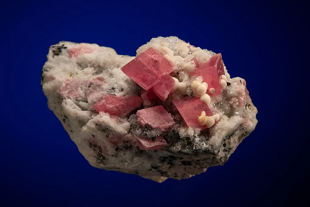 Rhodochrosite on Quartz image