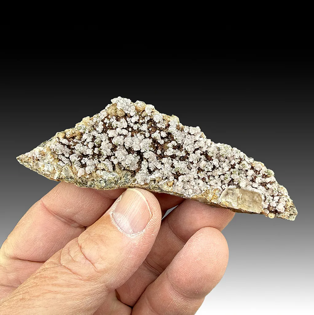 Rhodochrosite with Hisingerite-Neotocite image