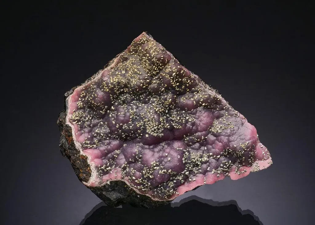 Rhodochrosite with Pyrite on Sphalerite image