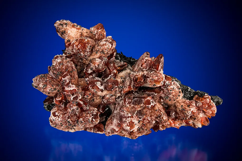 Rhodochrosite with Quartz on Manganite image
