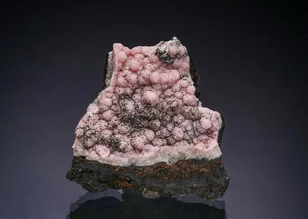 RHODOCHROSITE with WULFENITE image