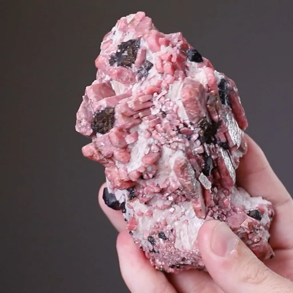 Rhodonite with Franklinite and Calcite image