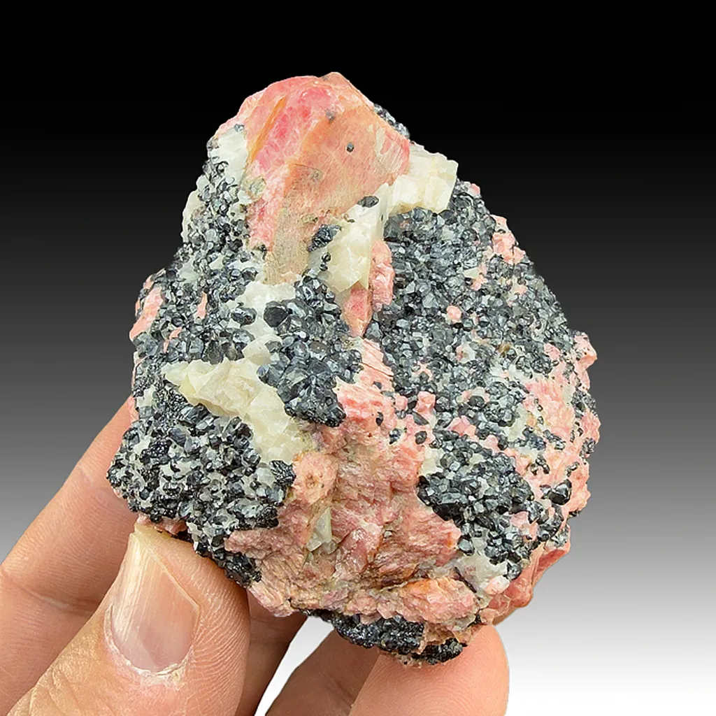 Rhodonite with Franklinite, Calcite image