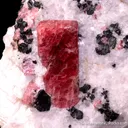 Rhodonite with Franklinite in Calcite - image 7