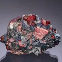 RHODONITE with SPESSARTINE in GALENA - image 1
