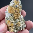 Roweite with Olshanskyite, Andradite, Calcite - image 2