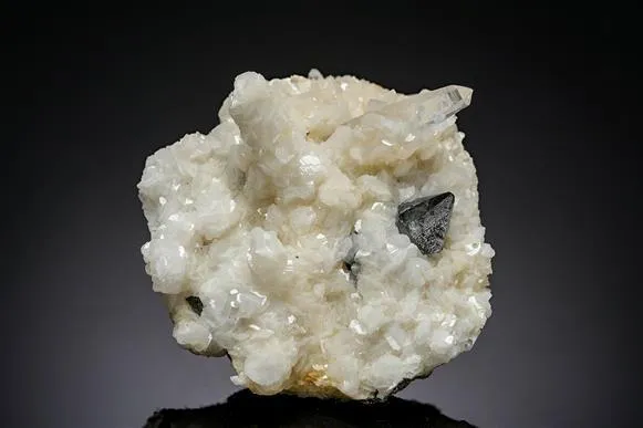 Scheelite and Calcite on Quartz image
