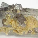 Scheelite (Fluorescent) on Quartz - image 1