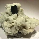 Schorl and Spessarite on Clevelandite - image 1