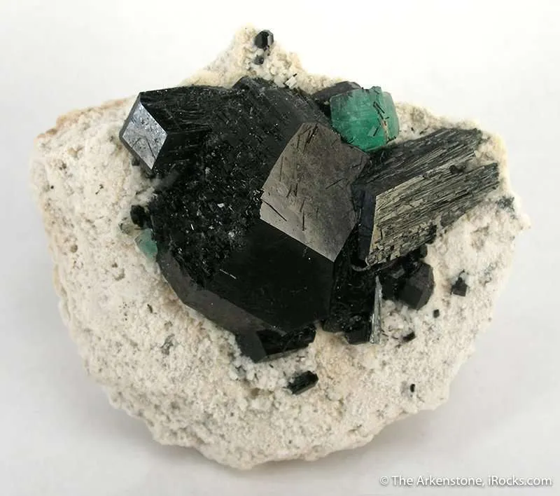 Schorl, Foitite, Fluorite on Feldspar image