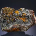 Scorodite with Karibibite on Lollingite - image 1