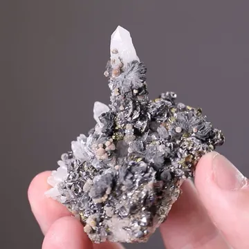Semseyite on Quartz