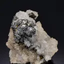 Skeletal Bournonite with Chalcopyrite and Quartz - image 1