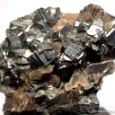 Skutterudite Var. Chloanthite on Quartz - image 1