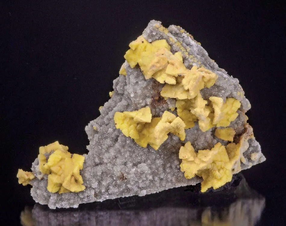 Smithsonite epimorphs after Dolomite crystals on Quartz image