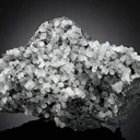 Smithsonite on Coronadite - image 1