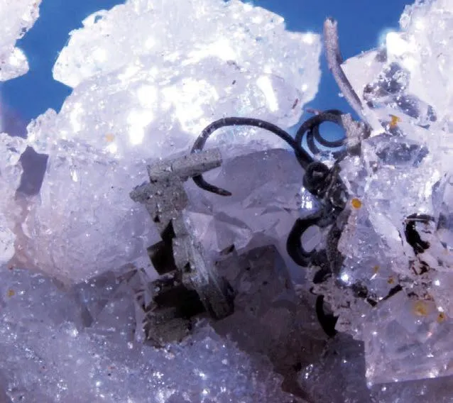 Smoky Quartz, Amethyst, filamentous colorless phantoms of a mineral not yet identified image