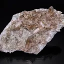 Smoky quartz on matrix with partial chlorite coating on the crystals - image 1