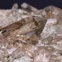 Smoky quartz on matrix with partial chlorite coating on the crystals - image 3
