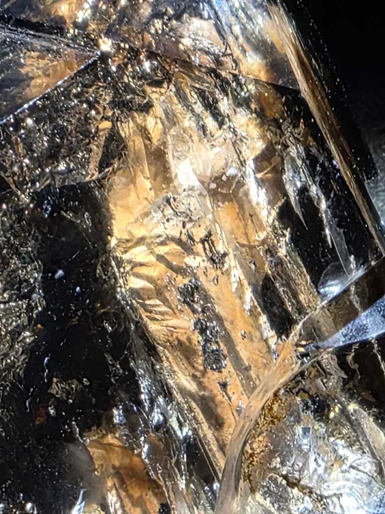 Smoky quartz with soil inclusions and triangles marks - image 8