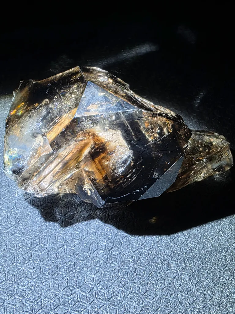 Smoky quartz with soil inclusions and triangles marks - image 3