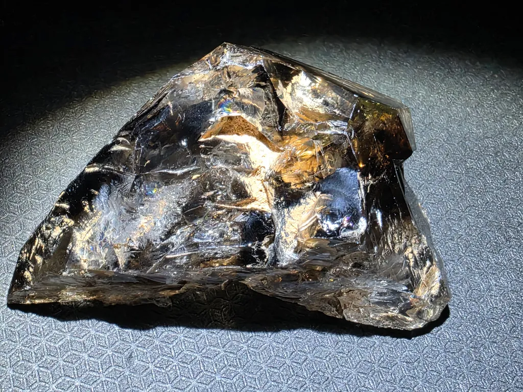 Smoky quartz with soil inclusions and triangles marks - image 4