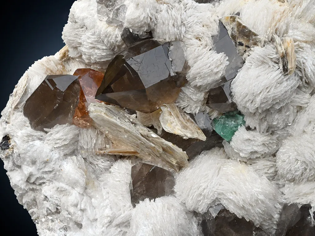 Smoky Quartz with Topaz and Fluorite on Cleavelandite image