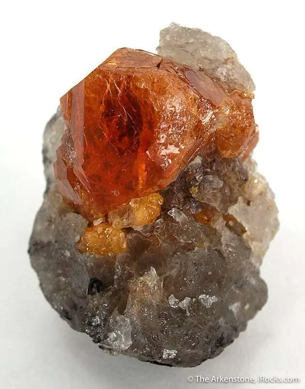 Spessartine Garnet on Quartz image