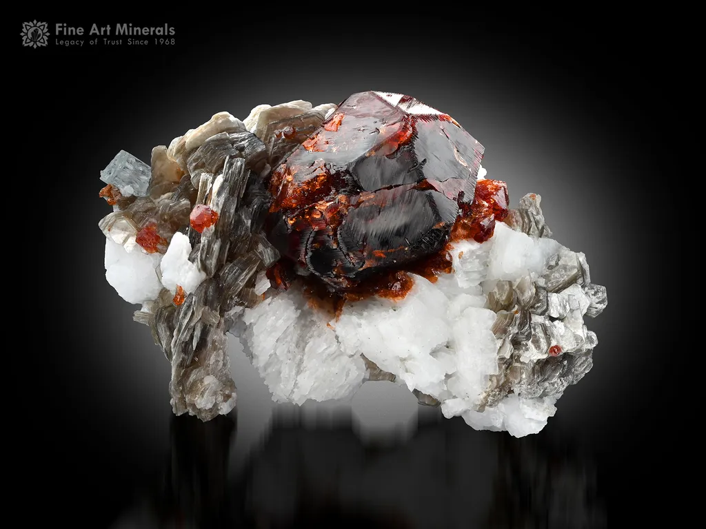 Spessartine Garnet with Muscovite and Feldspar image