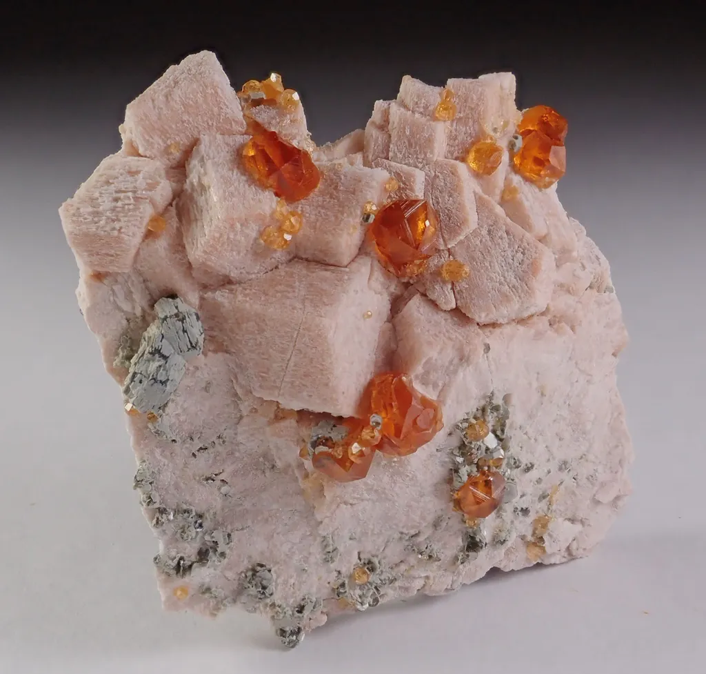 Spessartine Garnet with Quartz and Feldspar image