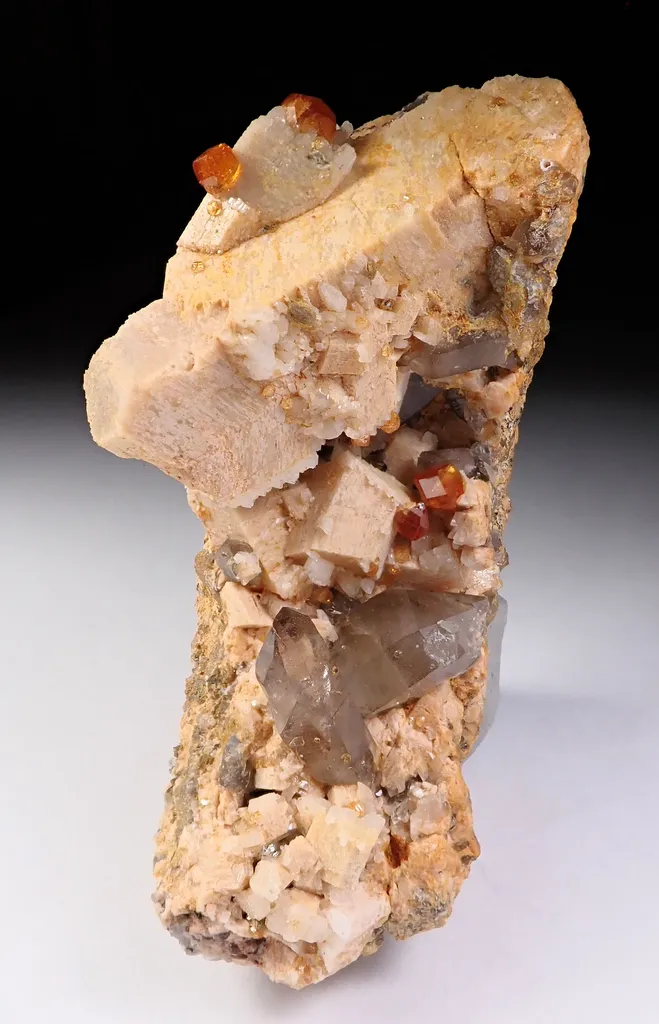 Spessartine Garnet with Quartz and Feldspar image