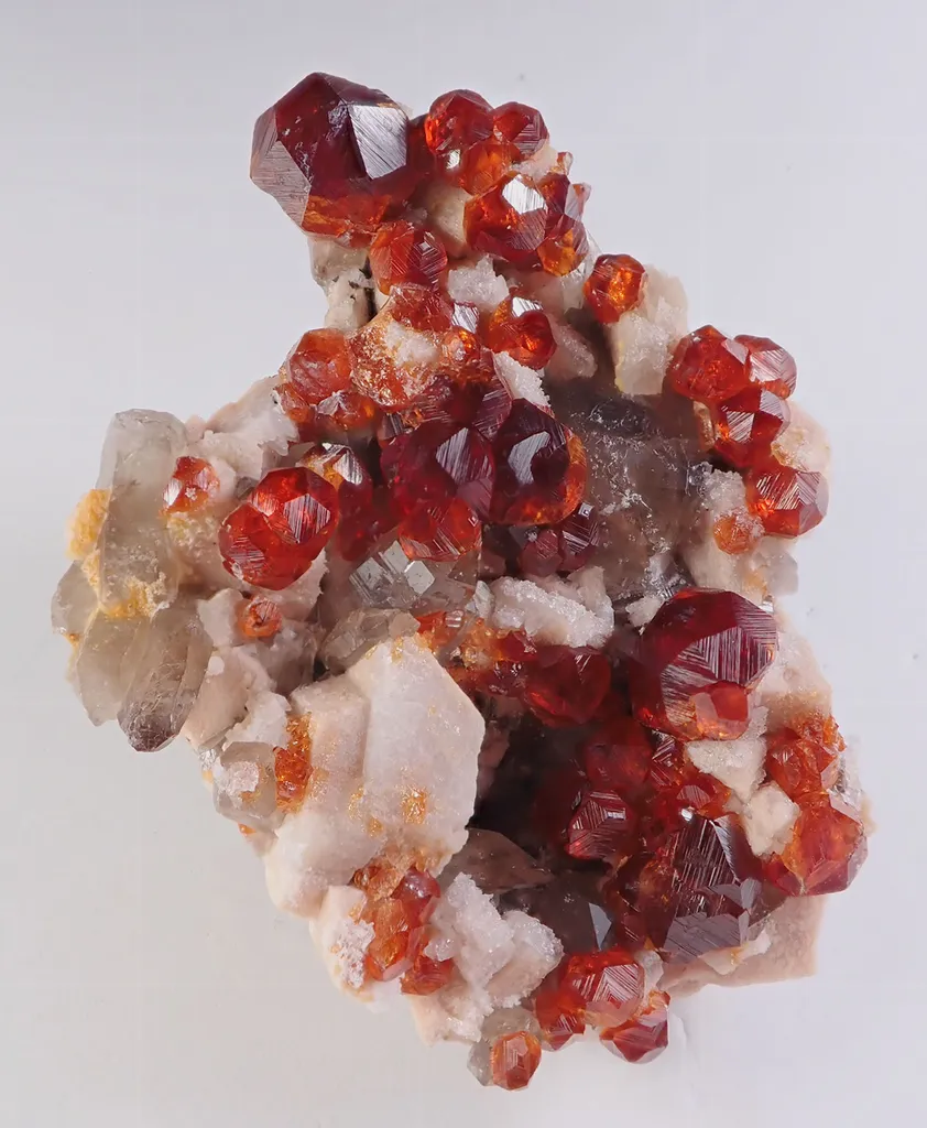 Spessartine Garnet with Quartz and Feldspar image
