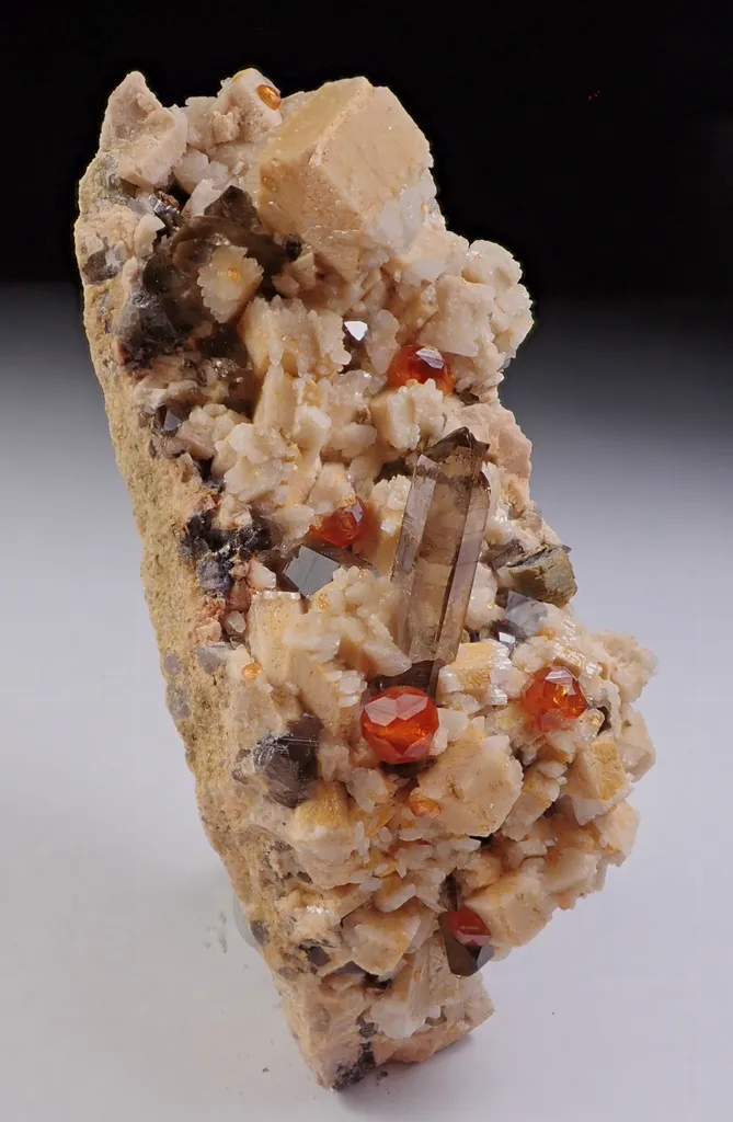 Spessartine Garnet with Quartz and Feldspar image