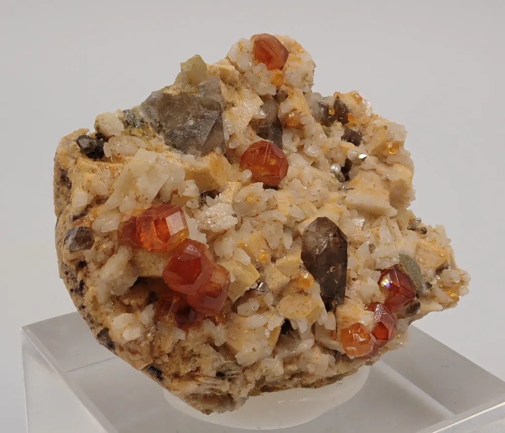 Spessartine Garnet with Quartz and Feldspar image