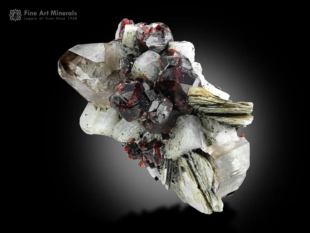 Spessartine Garnet with Quartz from Pakistan image