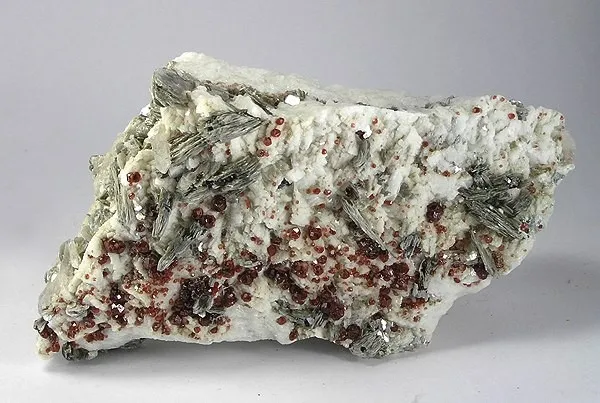 Spessartine, Muscovite image