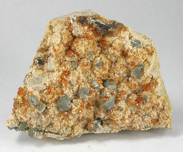 Spessartine, Muscovite image