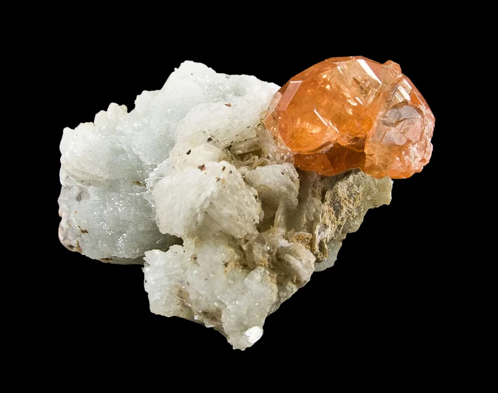 Spessartine on Albite image
