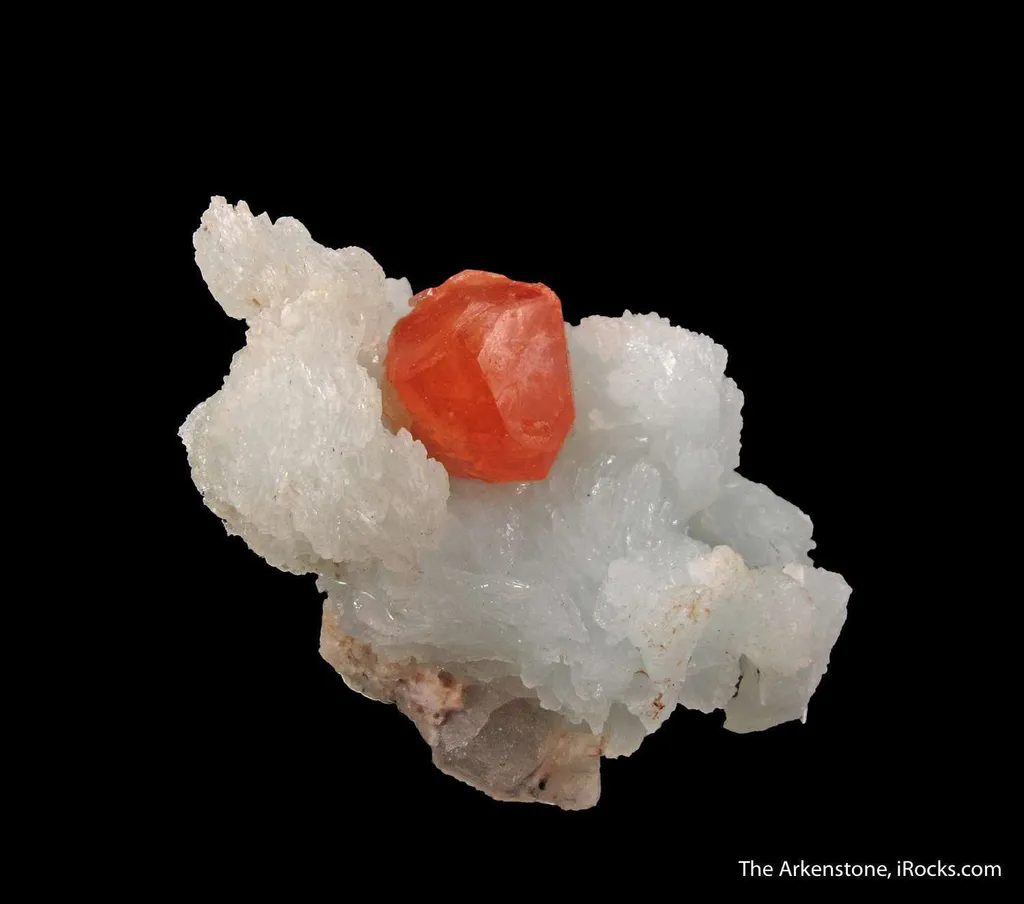 Spessartine on Albite image