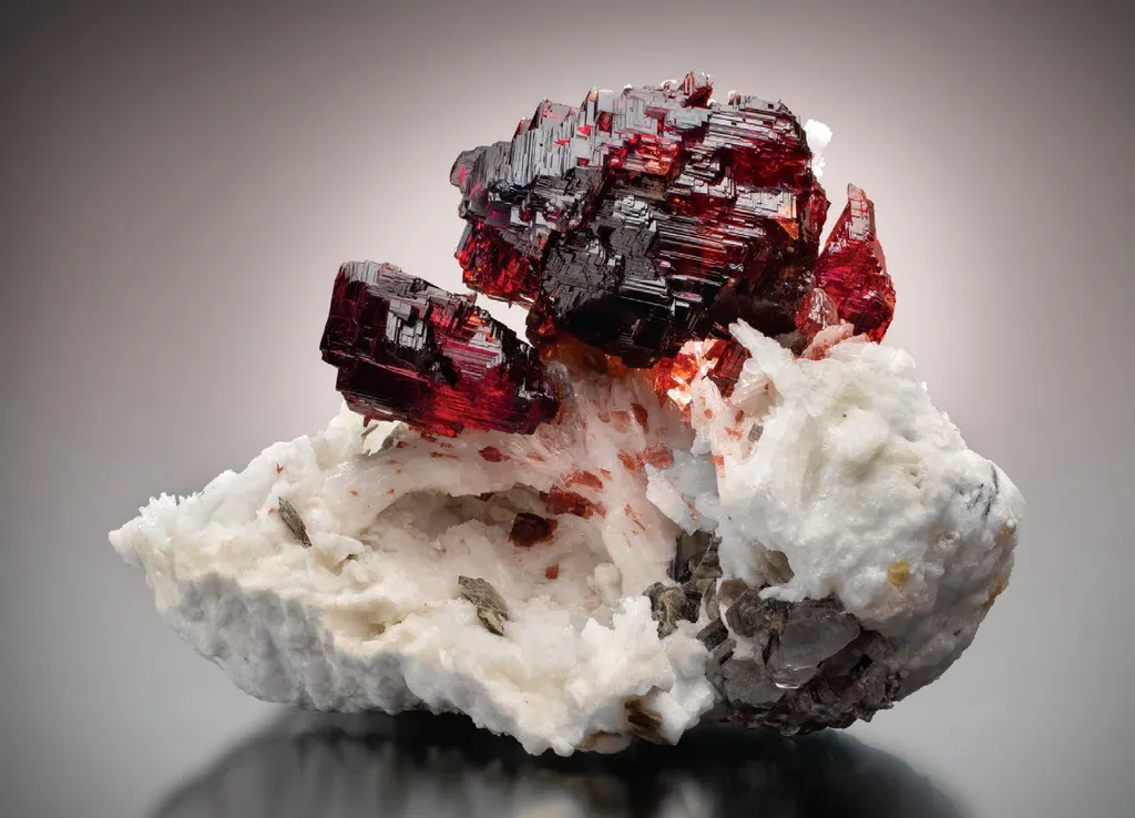 Spessartine on Albite image