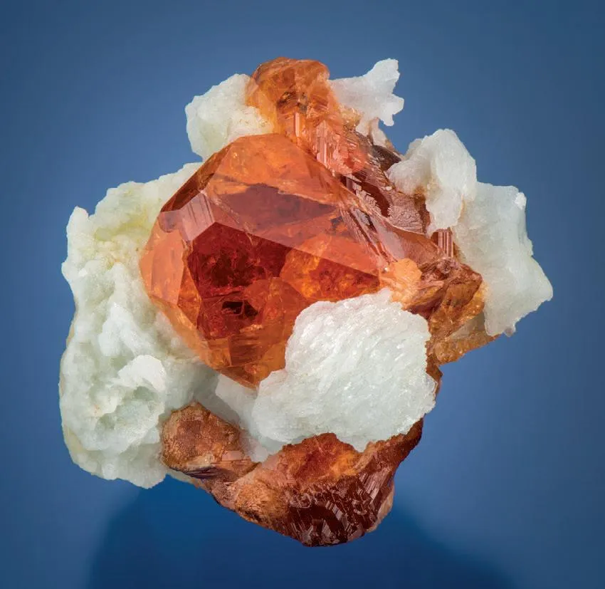 Spessartine on Albite image