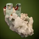 Spessartine on Beryl var. Aquamarine - image 1