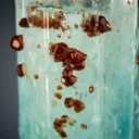 Spessartine on Beryl var. Aquamarine - image 2